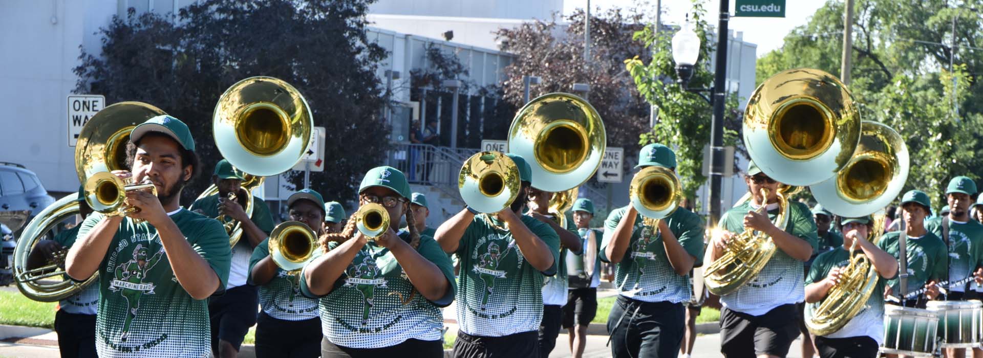 Chicago State University band marching during back to school parade