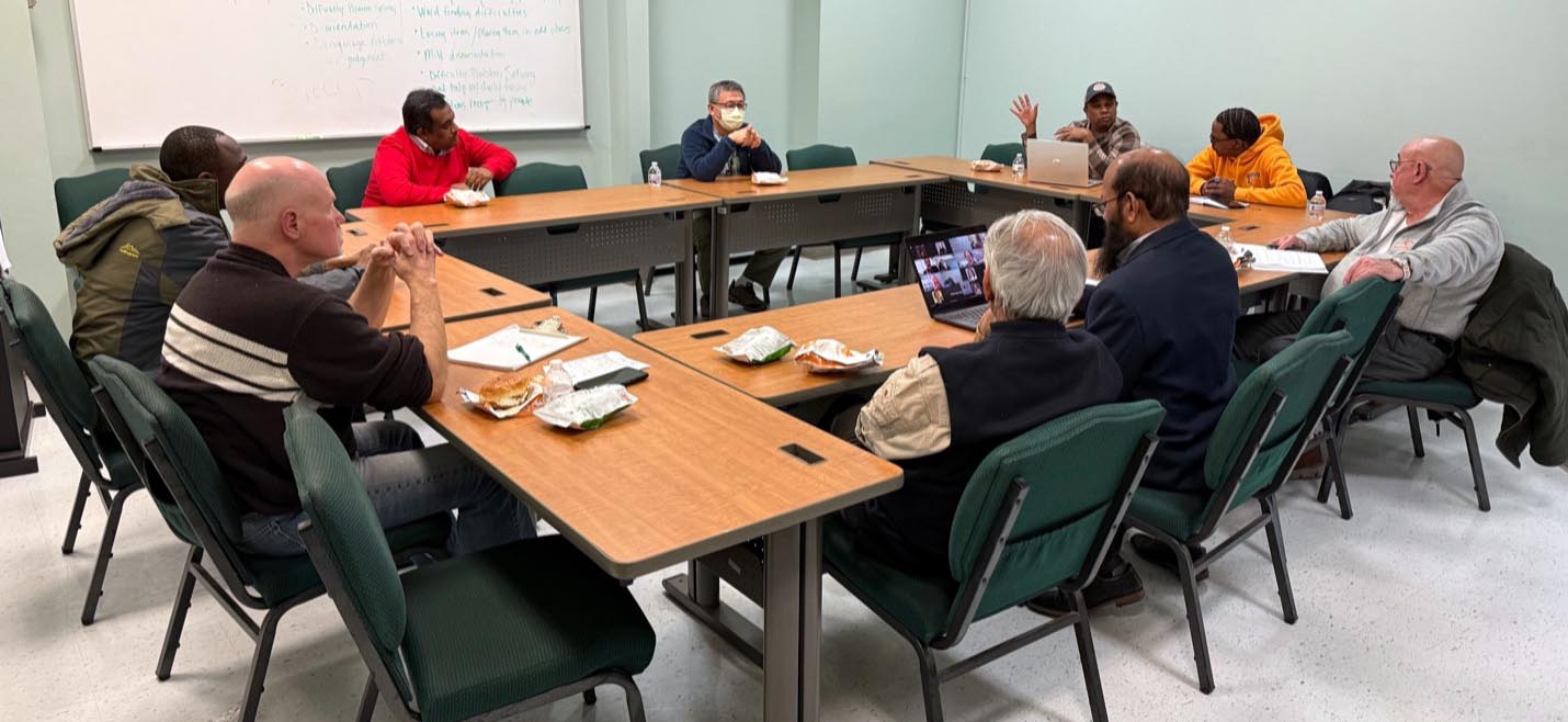 People sitting at conference table