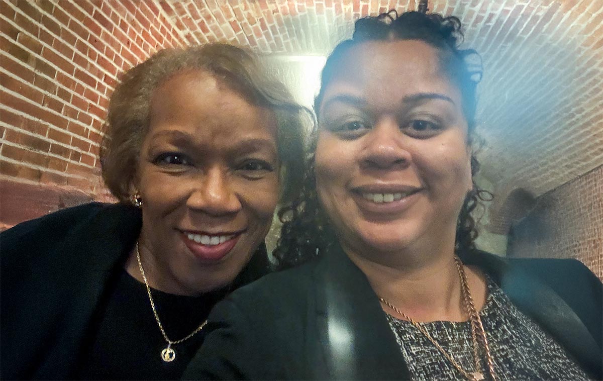 Up close "selfie" of Z. Scott, President of Chicago State University, and a student member of the Graduate Student Association.